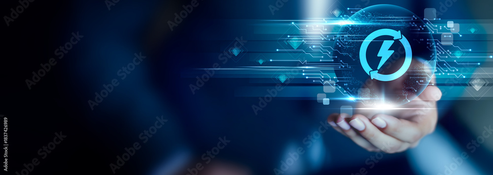 Fototapeta premium Energy Technology concept, Businessman hold Energy Technology icon. smart grids, clean power, renewable systems, energy efficiency, future innovation, sustainable solutions