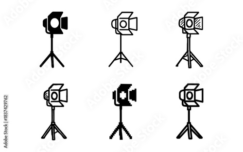 Set of different style studio lights on tripod stands