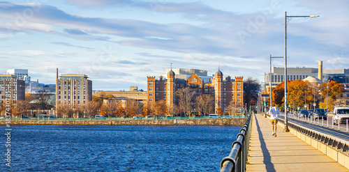 Bilde på lerret Charles River and Cambridge Skyline with Runners on Riverside Path