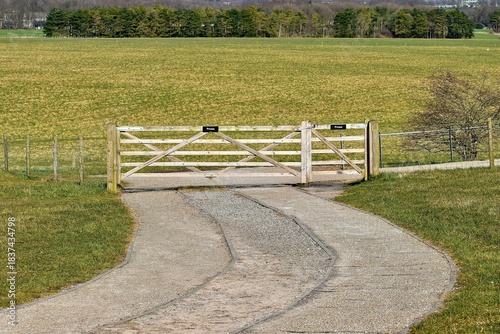 Wooden gate to a pasture in spring, Salisbury, England, UK