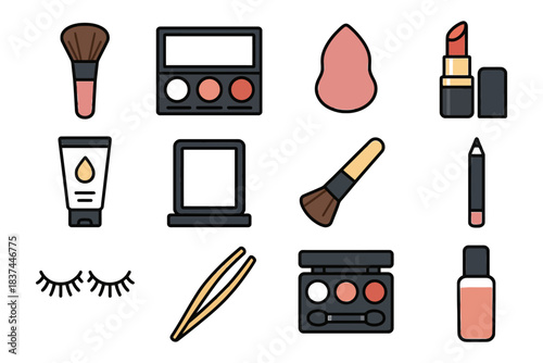 Assorted makeup tools and cosmetics set on white background.