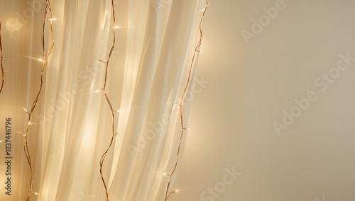 Warm string lights adorning sheer curtains, creating a cozy and soft ambiance with a neutral background