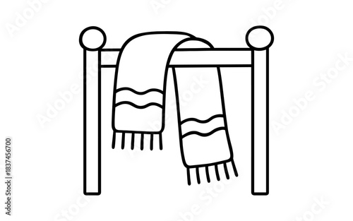 Minimalist towel rack with hanging blanket in linear style
