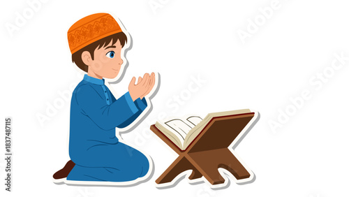 Young Boy Wearing Blue Traditional Outfit and Orange Kufi Hat Kneeling in Prayer Before an Open Holy Book on a Wooden Stand in a Simple Composition