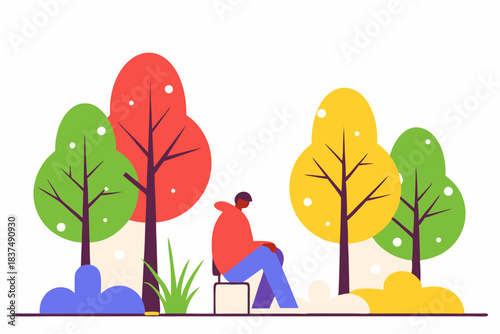 Mężczyzna siedzący w kolorowym jesiennym parku wśród drzew i krzewów.