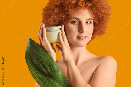 Young redhead woman with ja...