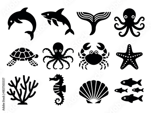 Vector collection of black sea animals including dolphins octopus starfish and other sea life