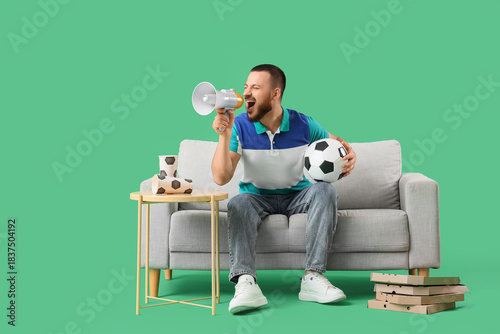 Male sports fan with soccer...