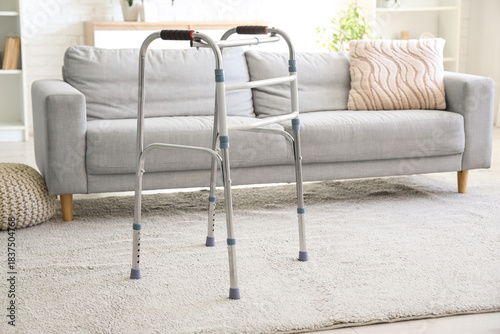 Medical walker on carpet in...