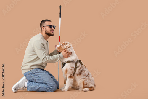 Blind young man with stick ...