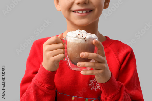 Smiling boy in red sweater ...