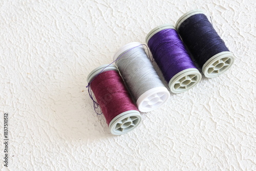 Close-Up of Colorful Embroidery Thread Spools