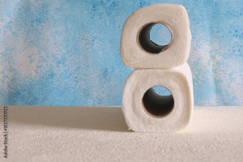 Close-Up of Rolled Paper Towels on a Blue Background