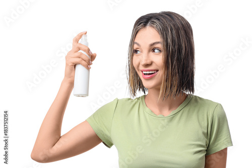 Happy young woman applying ...