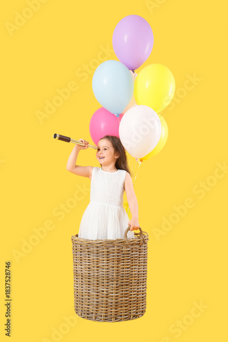 Cute little girl looking th...