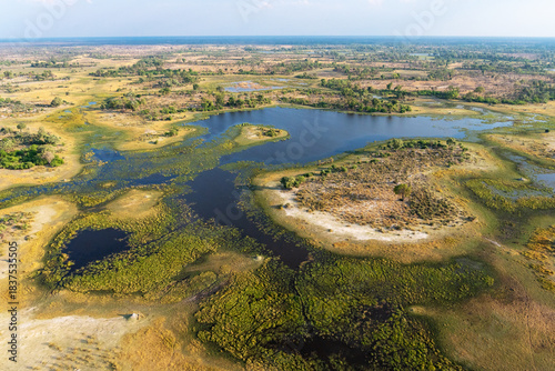 An aerial shot of a wetland in Okavango delta during an evening near Maun, Botswana