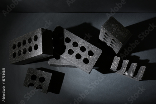 Black bricks on dark backgr...