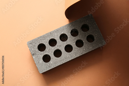 Grey brick on orange backgr...