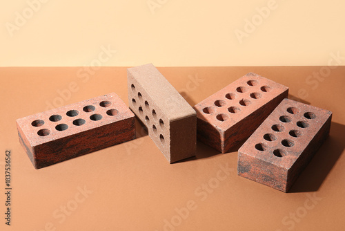 Brown bricks on orange back...