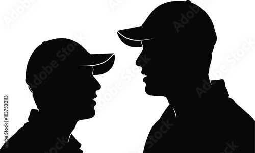 Silhouette vector of two people, likely a parent and child, facing each other in profile and wearing baseball caps, depicting conversation, family, youth, sport, and strong relationship bonds.