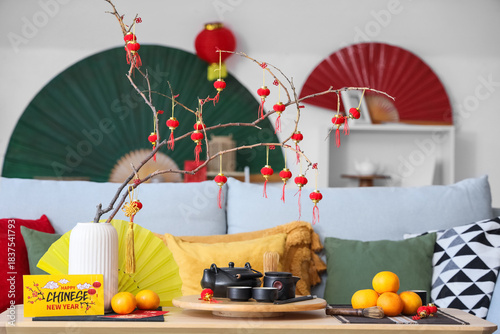 Vase with tree branches, ma...