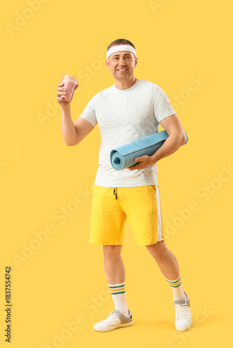 Sporty mature man with glas...