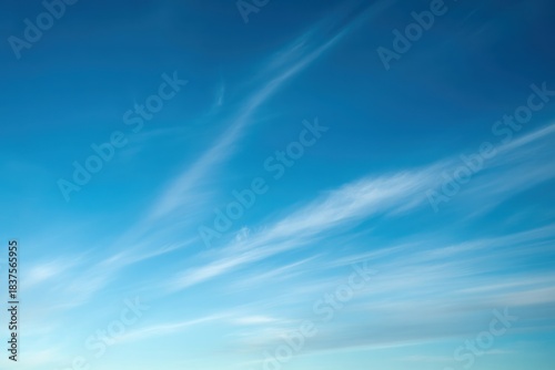 Bright blue sky background with fluffy white clouds, a beautiful abstract view of summer nature, weather, and light