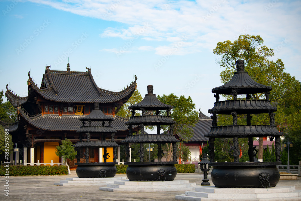 Naklejka premium Traditional Chinese architecture and exquisite incense burner landscape