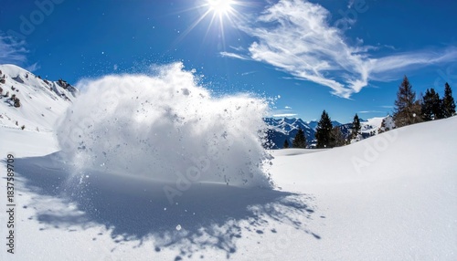 Explosive snowburst on a sunny slope