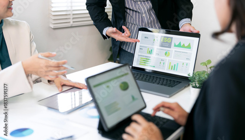 Business collaboration in the modern office: Professional team members are engaged in a strategic business meeting,