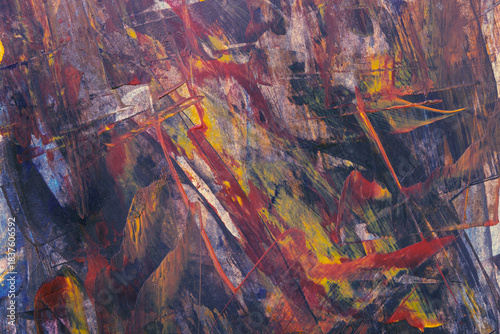 Abstract vivid colorful brush stroke patterns blend together to form a dynamic textured artistic grunge styled painted background	