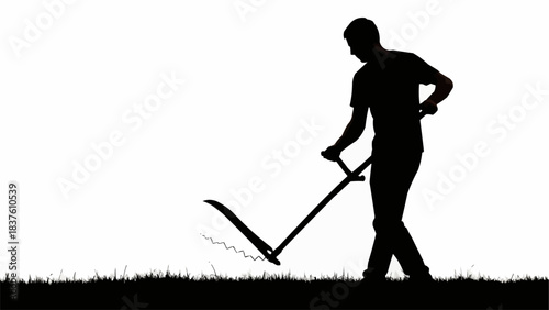 Silhouette of a man mowing grass with a scythe.