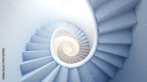 Elegant spiral staircase with a minimalist design and soft lighting.