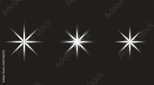 Set of three sparkling white starburst light flare effect set.