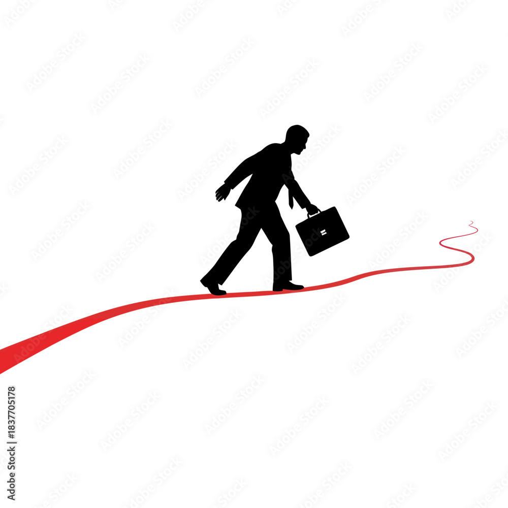 Obraz premium Silhouette of a businessman walking on a red line with a briefcase.