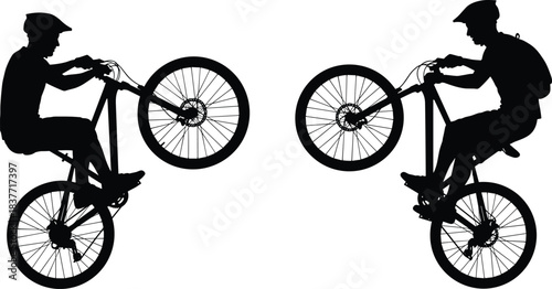 ilhouette of cyclists performing wheelie tricks on mountain bikes, extreme riding action demonstrating balance, control, sport skills and outdoor freestyle movement