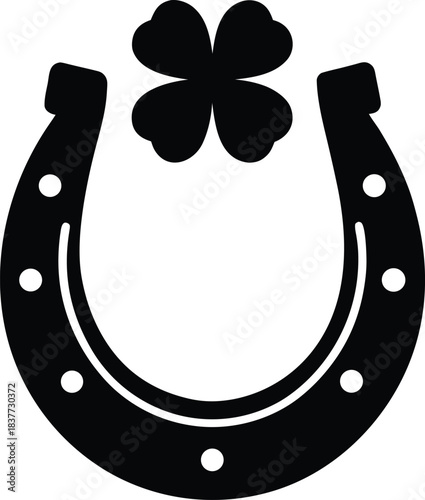 Black horseshoe with four leaf clover silhouette graphic