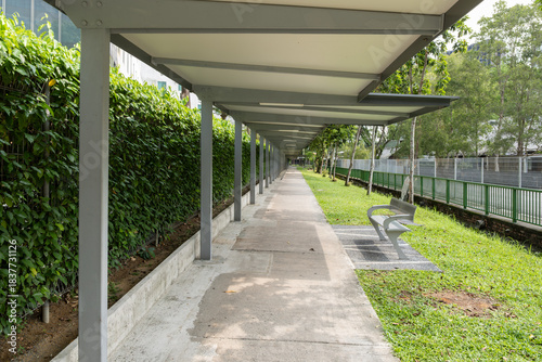 SModern walkway with shaded seating area along Orchard Road Singapore