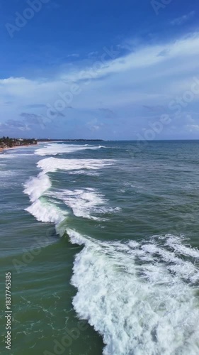 View of ocean waves breaking near a coastline in Sri Lanka South Asia