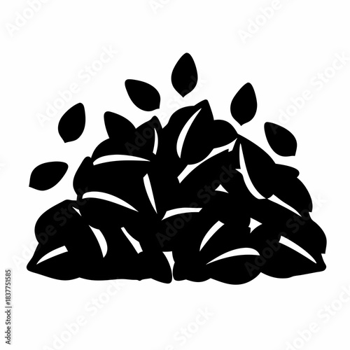 Graphic depiction of a pile of black leaves or seeds icon