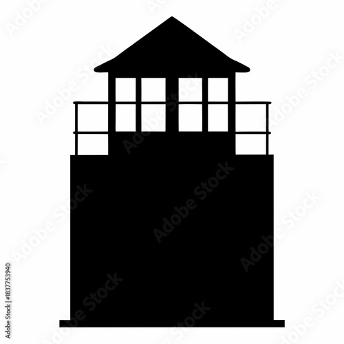 Black and white lighthouse on rocks standing tall against a white background