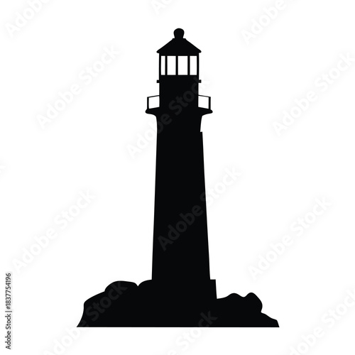 Black and white lighthouse on rocks standing tall against a white background
