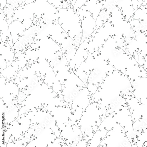 Delicate monochrome botanical pattern featuring fine branching stems with tiny scattered blossoms on white background