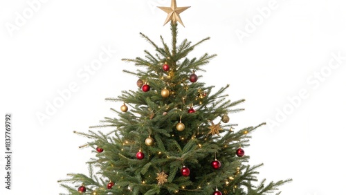 Festive Christmas tree decorated with red and gold balls, ornaments, and a star for the holiday season celebration