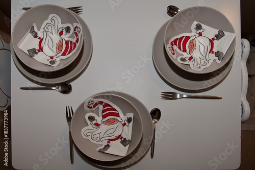 High angle view of children's table decorated for Christmas dinner