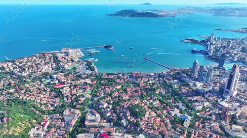Aerial View of Qingdao Coastal City Harbor with Turquoise Waters