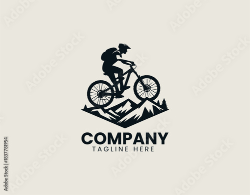 Mountain biker silhouette riding rugged trail in dynamic black vector logo illustration