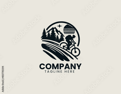 Mountain biker silhouette riding rugged trail in dynamic black vector logo illustration