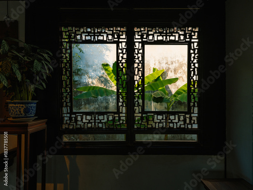 beautiful scenery through the framed window, interior design of Chinese Suzhou Garden, Suzhou City