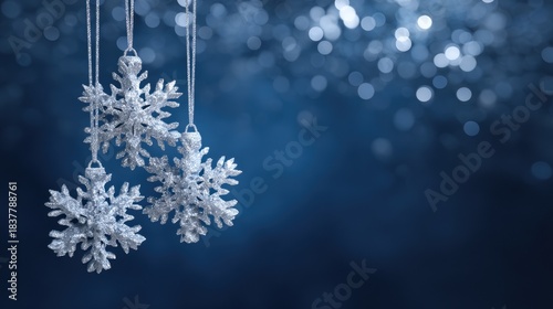 Frosted snowflake ornaments with silver glitter on indigo background, ideal for holiday branding, winter campaign visuals, luxury seasonal content, festive digital design

